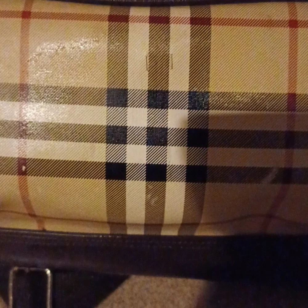 > Plaid Tan and Black Backpack